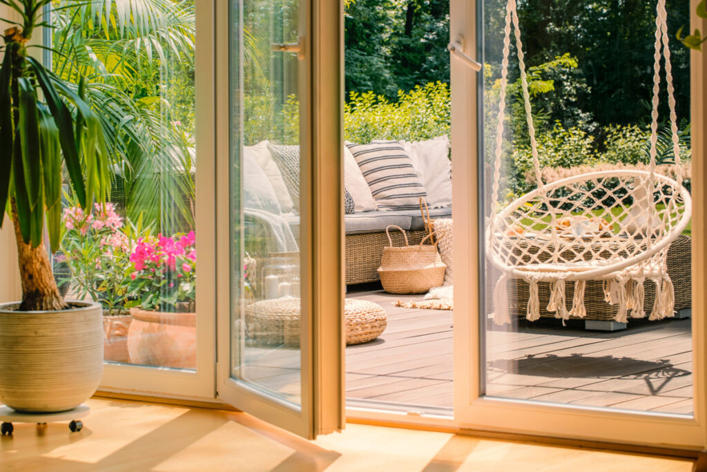 Glass patio doors leading onto a deck in El Paso.